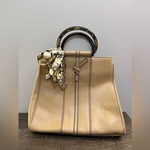 Tan leather tote with acrylic handles by Christine deGennaro